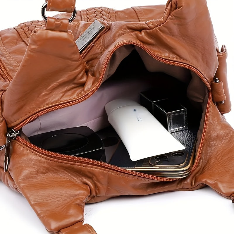 luxury handbag women featuring multiple pockets a designer