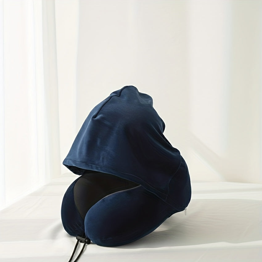 a neck pillow made a hood designed block light providing